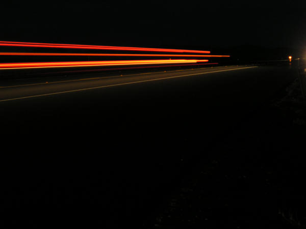 car_lights_streak_by_stewartsteve.jpg